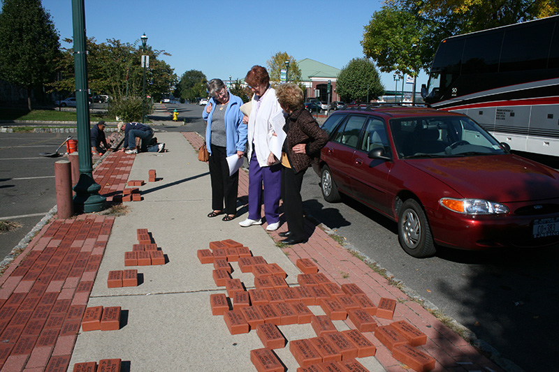 Placing the bricks on the Brick Walkway